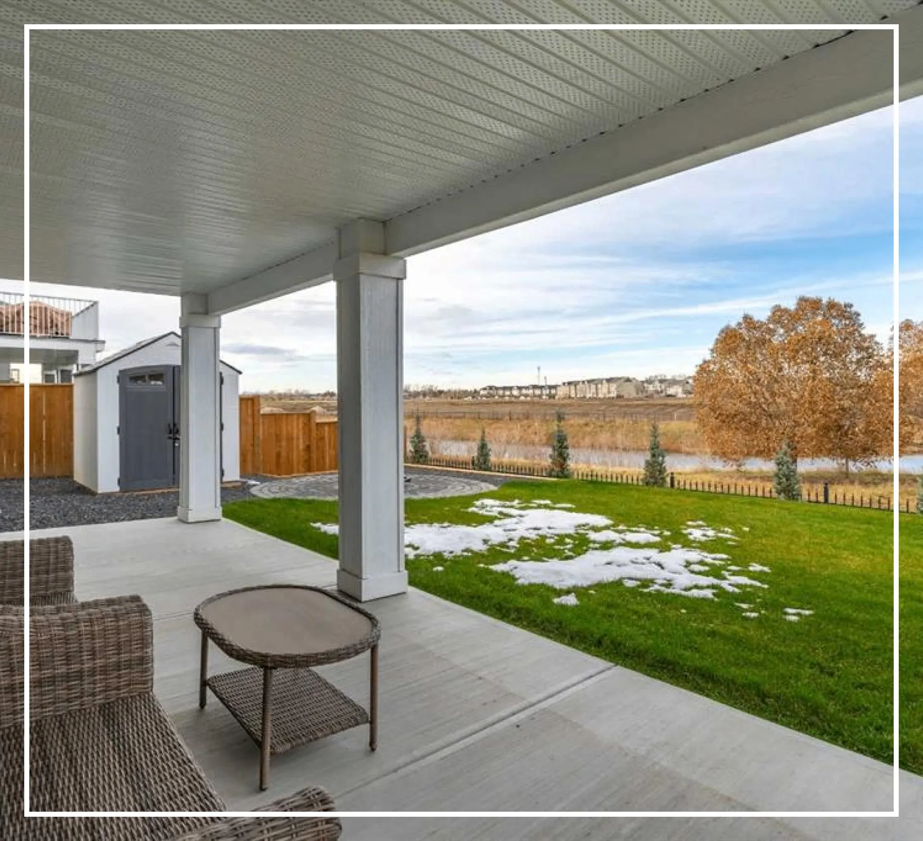 home-2nd-section A patio with furniture and grass in the middle of it.