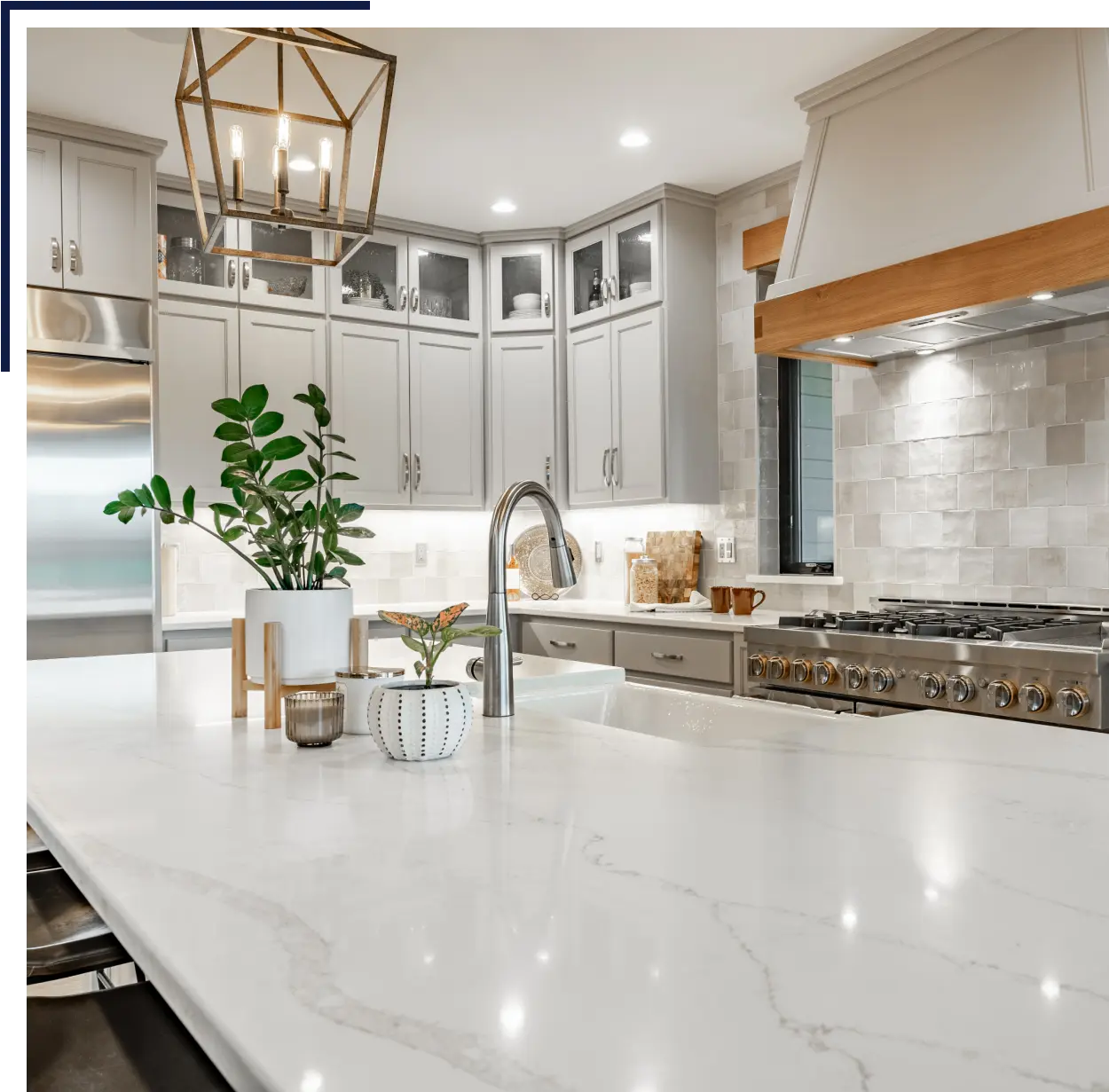 services-3rd-section-img1.png (1) A kitchen with white cabinets and marble counter tops.